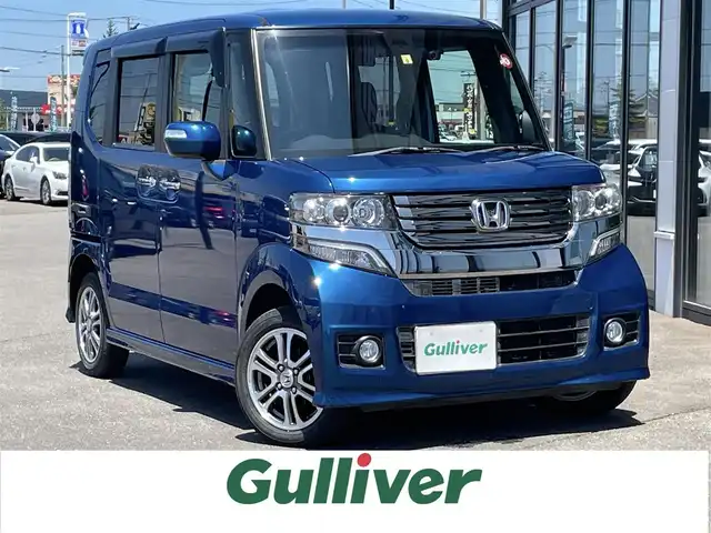 ホンダ Ｎ ＢＯＸ カスタム G Aパッケージ 道南・函館 2014(平26)年 2.4万km プレミアムダイナミックブルーパール ・純正ナビ/・ワンセグテレビ/・衝突被害軽減ブレーキ/・誤発信抑制機能/・横滑り防止装置/・片側パワースライドドア/・バックカメラ/・前後ドライブレコーダー/・オートライト/・スマートキー