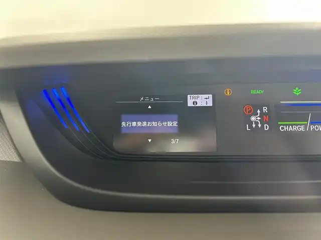 ホンダ フリード ハイブリット G ホンダセンシング 佐賀県 2019(平31)年 4.7万km ホワイトオーキッドパール ・Cパッケージ/・コンフォートビューパッケージ/純正９インチナビ　/両側パワースライドドア　/バックカメラ　/ＬＥＤヘッドライト　/フォグランプ　/ドライブレコーダー　/ビルドインＥＴＣ/フルセグＴＶ/寒冷地仕様　/ホンダセンシング/LEDアクティブコーナリングライト/衝突軽減ブレーキ〈CMBS〉/誤発進抑制機能/アダプティブ・クルーズ・コントロール/車線維持支援システム/歩行者事故低減ステアリング/路外逸脱抑制機能/先行車発進お知らせ機能/標識認識機能