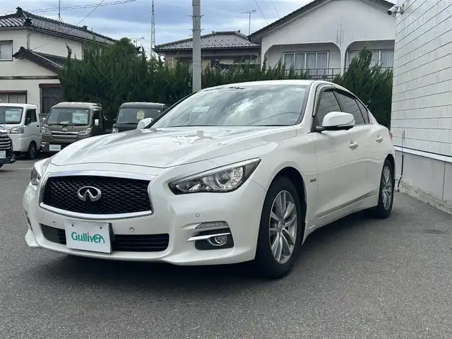 日産 スカイライン ハイブリッド 350GT FOUR 山形県 2016(平28)年 4.2万km ブリリアントホワイトパール 4WD/禁煙車/純正ナビフルセグＴＶ/エマージェンシーブレーキ/ビルトインＥＴＣ/エンジンスターター/レーダークルーズコントロール/ハーフレザーシート/スマートキー2個/プッシュスタート/全周囲カメラ/ドライブレコーダー/LEDヘッドライト/純正アルミホイール/オートライト/オートマチックハイビーム/Bluetooth接続/USB入力端子×2