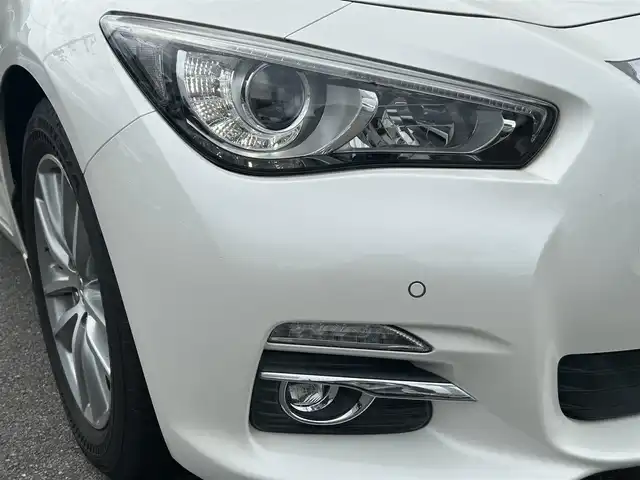 日産 スカイライン ハイブリッド 350GT FOUR 山形県 2016(平28)年 4.2万km ブリリアントホワイトパール 4WD/禁煙車/純正ナビフルセグＴＶ/エマージェンシーブレーキ/ビルトインＥＴＣ/エンジンスターター/レーダークルーズコントロール/ハーフレザーシート/スマートキー2個/プッシュスタート/全周囲カメラ/ドライブレコーダー/LEDヘッドライト/純正アルミホイール/オートライト/オートマチックハイビーム/Bluetooth接続/USB入力端子×2