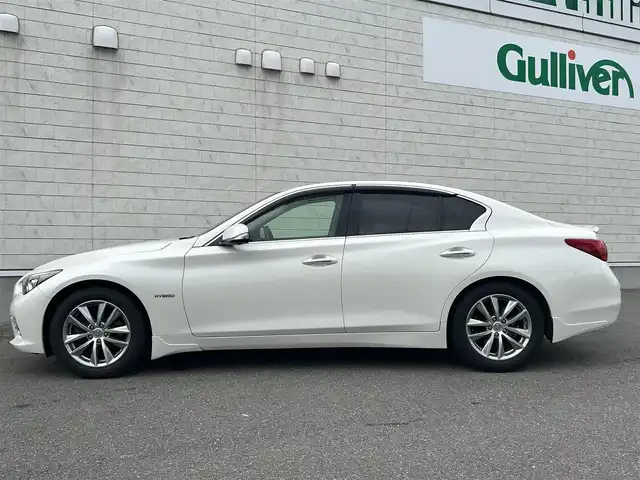 日産 スカイライン ハイブリッド 350GT FOUR 山形県 2016(平28)年 4.2万km ブリリアントホワイトパール 4WD/禁煙車/純正ナビフルセグＴＶ/エマージェンシーブレーキ/ビルトインＥＴＣ/エンジンスターター/レーダークルーズコントロール/ハーフレザーシート/スマートキー2個/プッシュスタート/全周囲カメラ/ドライブレコーダー/LEDヘッドライト/純正アルミホイール/オートライト/オートマチックハイビーム/Bluetooth接続/USB入力端子×2