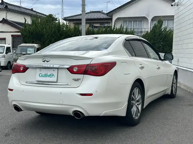 日産 スカイライン ハイブリッド 350GT FOUR 山形県 2016(平28)年 4.2万km ブリリアントホワイトパール 4WD/禁煙車/純正ナビフルセグＴＶ/エマージェンシーブレーキ/ビルトインＥＴＣ/エンジンスターター/レーダークルーズコントロール/ハーフレザーシート/スマートキー2個/プッシュスタート/全周囲カメラ/ドライブレコーダー/LEDヘッドライト/純正アルミホイール/オートライト/オートマチックハイビーム/Bluetooth接続/USB入力端子×2