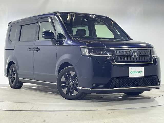 ホンダ ステップワゴン スパーダ eHEV 神奈川県 2023(令5)年 3.4万km ミッドナイトブルービームM ホンダセンシング　/純正11.4インチメモリナビ/CD/DVD/BT/フルセグ/マルチビューカメラ /両側パワースライドドア /パワーバックドア /レーダークルーズコントロール /LEDオートライト /ハーフレザー /シートヒーター/純正フロアマット/純正16インチアルミホイール/ステアリングスイッチ /純正ETC/横滑り防止装置/盗難防止装置/衝突被害軽減システム
