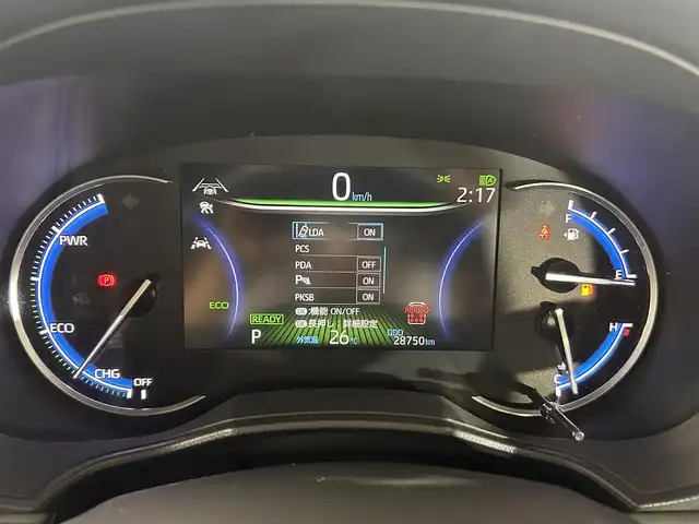 トヨタ ヴォクシー ハイブリッド S－Z 熊本県 2023(令5)年 2.9万km グリッターブラックガラスフレーク 純正10.5インチナビ/CD/DVD/フルセグTV/Bluetooth/純正14インチフリップダウンモニター/両側パワースライドドア/トヨタセーフティセンス/プリクラッシュセーフティ/レーンディパーチャーアラート/クリアランスソナー/パーキングサポートブレーキ/ロードサインアシスト/プロアクティブドライビングアシスト/快適利便パッケージ/ユニバーサルステップ/ハーフレザーシート/シートヒーター/オットマン/１００V充電/追従付きクルーズコントロール/オートハイビーム/前後ドライブレコーダー/ビルトインETC2.0/フロアマット/純正ドアバイザー/純正17インチアルミホイール