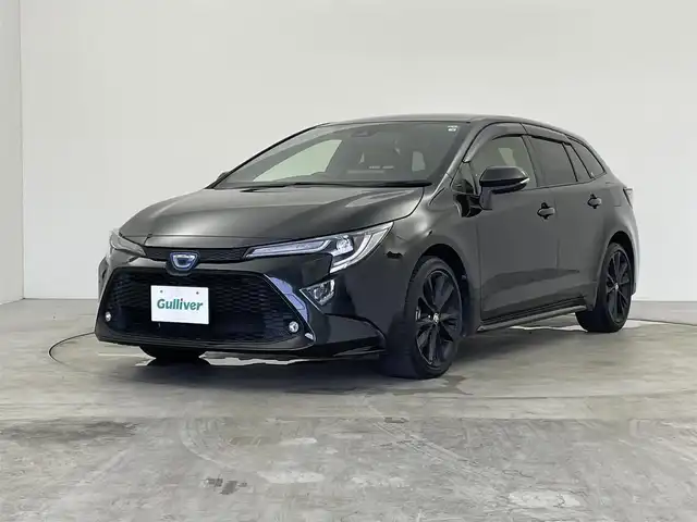 トヨタ カローラツーリング ハイブリッド ダブルバイビー 群馬県 2022(令4)年 2.6万km ブラックマイカ 純正８インチディスプレイオーディオ　バックカメラ　レーダークルーズコントロール　ＢＳＭ　ハーフレザーシート　シートヒーター　純正１７インチマットブラックＡＷ　ステアリングリモコン　ＥＴＣ２．０　禁煙車