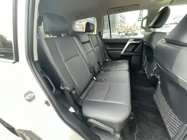 トヨタ ランドクルーザー プラド TX Lパッケージ 千葉県 2023(令5)年 2.7万km ホワイトパールクリスタルシャイン モデリスタエアロ(F/R)/サンルーフ/黒レザーシート/ALPINEビッグX11インチSDナビ【XF11NX】/・CD/DVD/MSV/Bluetooth/フルセグTV/ALPINEデジタルインナーミラー/前席パワーシート/前席シートヒーター/前席シートベンチレーション/トヨタセーフティーセンス/・プリクラッシュセーフティー/・レーンキープアシスト/・ロードサインアシスト/・オートマチックハイビーム/・アダプティブクルーズコントロール/電動格納サードシート/バックカメラ/スマートキー/前後コーナーセンサー/ルーフレール/ウッドコンビステアリング/サイドステップ/純正LEDヘッドライト/フォグランプ/ETC/社外ドライブレコーダー/サイド＆カーテンエアバッグ