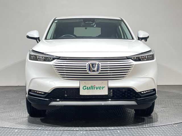 ホンダ ヴェゼル ハイブリッド e:HEV Z 愛媛県 2023(令5)年 1.7万km プラチナホワイトパール 純正9インチナビ/Bluetooth/フルセグ/USB/バックカメラ/レーダークルーズコントロール/衝突被害軽減ブレーキ/レーンキープアシスト/前後コーナーセンサー/ブラインドスポットモニター/ダウンヒルアシストコントロール/ミラー型ドライブレコーダー/LEDヘッドライト/オートマチックハイビーム/オートライト/ワイヤレス充電/シートヒーター/ステアリングヒーター/ETC/スペアキー/保証書/取扱説明書