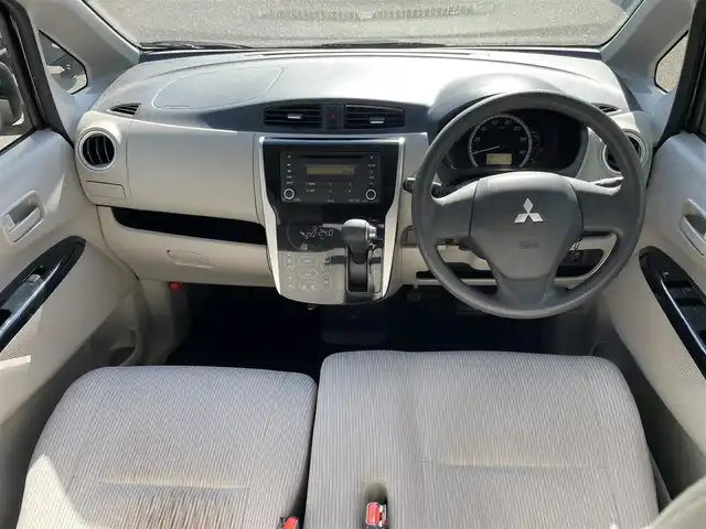 三菱 ｅＫワゴン M 新潟県 2013(平25)年 8.5万km パープリッシュネイビーパール ワンオーナー/社外ホイールスタッドレスタイヤ装着/アイドリングストップ/ドアバイザー/純正フロアマット/電動格納ドアミラー/レベライザー