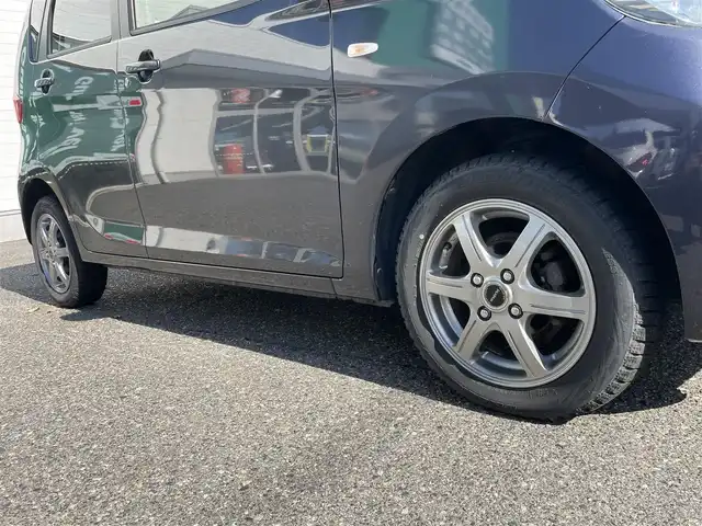 三菱 ｅＫワゴン M 新潟県 2013(平25)年 8.5万km パープリッシュネイビーパール ワンオーナー/社外ホイールスタッドレスタイヤ装着/アイドリングストップ/ドアバイザー/純正フロアマット/電動格納ドアミラー/レベライザー