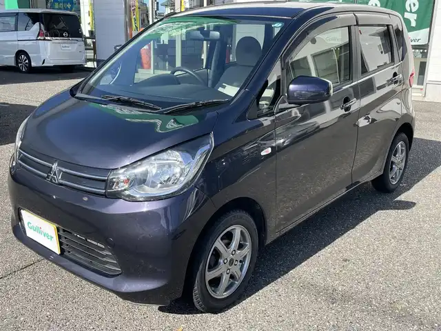 三菱 ｅＫワゴン M 新潟県 2013(平25)年 8.5万km パープリッシュネイビーパール ワンオーナー/社外ホイールスタッドレスタイヤ装着/アイドリングストップ/ドアバイザー/純正フロアマット/電動格納ドアミラー/レベライザー