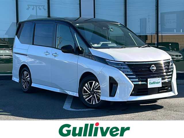 日産 セレナ e－パワー ハイウェイスター V 岐阜県 2023(令5)年 5.1万km パールⅡ 登録時走行距離50196km/カラーコード　XKJ　(プリズムホワイト/スーパーブラック)/フリップダウンモニター/全方位カメラ/純正ＳＤナビ/バックカメラ/フルセグＴＶ/両側パワースライドドア/2トーン/レーンキープアシスト/クルーズコントロール/コーナーセンサー/ドライブレコーダー/ビルトインＥＴＣ/禁煙車/プッシュスタート/スマートキー/スペアキー/パーキングアシスト/USB入力端子/純正アルミホイール/LEDヘッドライト/オートライト
