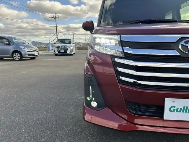 トヨタ ルーミー カスタムG 佐賀県 2021(令3)年 3.4万km ファイアークォーツレッドM 純正9インチディスプレイオーディオ/・フルセグTV/AM/FM/USB/Bluetooth/・Apple Car Play/Android Auto/バックカメラ/前後ドライブレコーダー/ビルトインETC/両側パワースライドドア/電子パーキングブレーキ/・AUTO HOLD機能/DN席シートヒーター/後席サンシェード/ISOFIX対応/革巻きステアリング/ステアリングリモコン/純正14インチアルミホイール/純正LEDヘッドライト/・オートマチックハイビーム/純正LEDフォグランプ/純正フロアマット/純正ドアバイザ―/取扱説明書/スペアキー１本/スマートアシスト/・レーダークルーズコントロール/・先行車発進お知らせ機能/・車線逸脱警報機能/・衝突軽減ブレーキ/・標識認識機能/・ふらつき警報/・クリアランスソナー