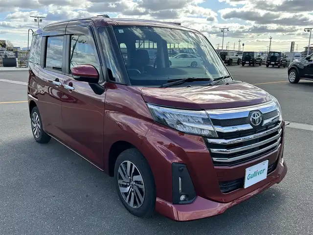 トヨタ ルーミー カスタムG 佐賀県 2021(令3)年 3.4万km ファイアークォーツレッドM 純正9インチディスプレイオーディオ/・フルセグTV/AM/FM/USB/Bluetooth/・Apple Car Play/Android Auto/バックカメラ/前後ドライブレコーダー/ビルトインETC/両側パワースライドドア/電子パーキングブレーキ/・AUTO HOLD機能/DN席シートヒーター/後席サンシェード/ISOFIX対応/革巻きステアリング/ステアリングリモコン/純正14インチアルミホイール/純正LEDヘッドライト/・オートマチックハイビーム/純正LEDフォグランプ/純正フロアマット/純正ドアバイザ―/取扱説明書/スペアキー１本/スマートアシスト/・レーダークルーズコントロール/・先行車発進お知らせ機能/・車線逸脱警報機能/・衝突軽減ブレーキ/・標識認識機能/・ふらつき警報/・クリアランスソナー