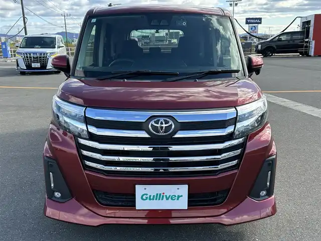 トヨタ ルーミー カスタムG 佐賀県 2021(令3)年 3.4万km ファイアークォーツレッドM 純正9インチディスプレイオーディオ/・フルセグTV/AM/FM/USB/Bluetooth/・Apple Car Play/Android Auto/バックカメラ/前後ドライブレコーダー/ビルトインETC/両側パワースライドドア/電子パーキングブレーキ/・AUTO HOLD機能/DN席シートヒーター/後席サンシェード/ISOFIX対応/革巻きステアリング/ステアリングリモコン/純正14インチアルミホイール/純正LEDヘッドライト/・オートマチックハイビーム/純正LEDフォグランプ/純正フロアマット/純正ドアバイザ―/取扱説明書/スペアキー１本/スマートアシスト/・レーダークルーズコントロール/・先行車発進お知らせ機能/・車線逸脱警報機能/・衝突軽減ブレーキ/・標識認識機能/・ふらつき警報/・クリアランスソナー