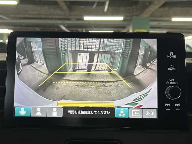 ホンダ ヴェゼル ハイブリッド e:HEV Z 愛知県 2025(令7)年 0.1万km未満 パール 登録済未使用車/純正9インチメモリナビ/（AppleCarPlay/AndroidAuto/Bluetooth/フルセグTV)/Honda CONNECTディスプレー+ETC2.0車載器+ワイヤレス充電器(220000)/バックカメラ/ワイヤレス充電/シーケンシャルウインカー/衝突軽減ブレーキ/レーンキープアシスト/追従式クルーズコントロール/オートマチックハイビーム/ブラインドスポットモニター/ETC2.0/革巻きステアリング/ステアリングヒーター/シートヒーター/LEDヘッドライト/パドルシフト/ダウンヒルアシスト/スマートキー/スペアキー有/純正アルミホイール/コーナーセンサー