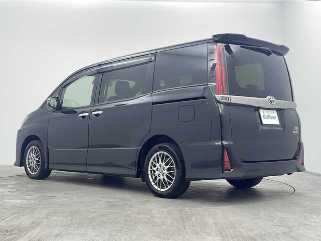 トヨタ ノア ハイブリッド Si ダブルバイビーⅢ 三重県 2021(令3)年 6.4万km ブラック 禁煙車/純正10インチナビ/CD/DVD/BT/MSV/HDMI/USB/フルセグTV/純正12.3インチフリップダウンモニター/両側パワースライドドア/クリアランスソナー/ハーフレザーシート/シートヒーター/ドライブレコーダー/クルーズコントロール/フォグライト/オートハイビーム/衝突被害軽減ブレーキ/車線逸脱警報機能付き/保証書/スマートキー