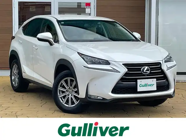 レクサス ＮＸ 300h Iパッケージ 宮崎県 2015(平27)年 7.7万km ソニッククォーツ 純正ナビ/　(Bluetooth/DVD/Blu-ray)/フルセグTV/パワーバックドア/バック/サイド/フロントカメラ/ビルトインETC/ドライブレコーダー/クルーズコントロール/クリアランスソナー/ビークルスタビリティコントロール/角型三眼LEDヘッドランプ/オートライトシステム/本革巻きステアリング/ステアリングヒーター/パドルシフト/ホワイトオーカー合皮シート/前席パワーシート/シートヒーター/運転席ポジションメモリー付/純正17インチアルミホイール/スマートエントリー/スタートシステム/禁煙車