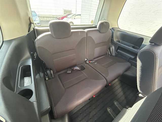 日産 セレナ ハイウェイスター Vセレクション 大阪府 2009(平21)年 5.5万km ホワイトパール 純正7インチナビ/(ワンセグTV/CD/DVD)/純正8インチ後席モニター/バックモニター/両側パワースライドドア/3列シート/オートエアコン/キセノンヘッドライト/オートライト/盗難防止装置/純正16インチアルミホイール/純正フロアマット/ETC/保証書/取扱説明書/スマートキー×1