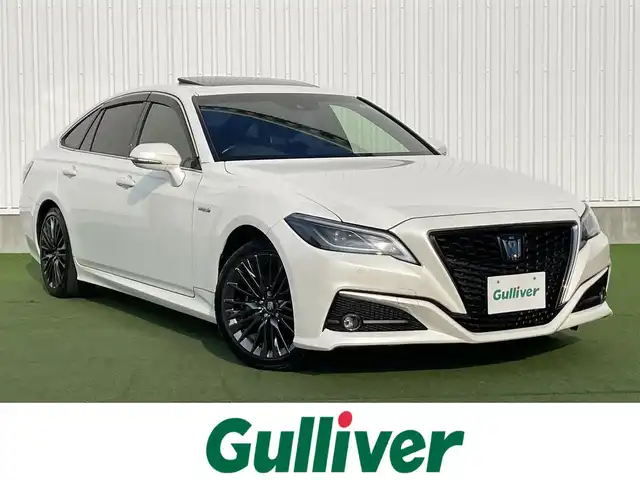 トヨタ クラウン ハイブリッド S スポーツスタイル 香川県 2019(令1)年 5.8万km ホワイトパールクリスタルシャイン 登録時走行距離：57769ｋｍ/純正SDナビゲーション/→フルセグTV/→CD/DVD/バックカメラ/ビルトインETC/サンルーフ/ブラインドスポットモニター/レーダークルーズコントロール/ステアリングリモコン/革巻きステアリング/前後コーナーセンサー/LEDオートライト/フォグランプ/純正18インチアルミホイール/純正フロアマット/パワーシート/スマートキー