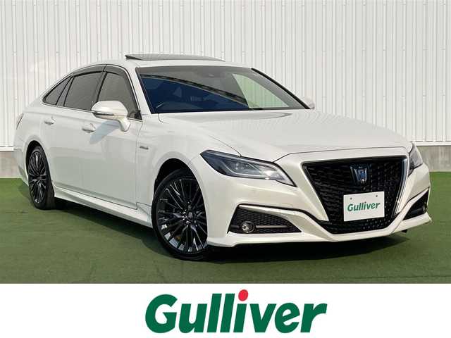 トヨタ クラウン ハイブリッド S スポーツスタイル 愛媛県 2019(令1)年 5.8万km ホワイトパールクリスタルシャイン 登録時走行距離：57769ｋｍ/純正SDナビゲーション/→フルセグTV/→CD/DVD/バックカメラ/ビルトインETC/サンルーフ/ブラインドスポットモニター/レーダークルーズコントロール/ステアリングリモコン/革巻きステアリング/前後コーナーセンサー/LEDオートライト/フォグランプ/純正18インチアルミホイール/純正フロアマット/パワーシート/スマートキー