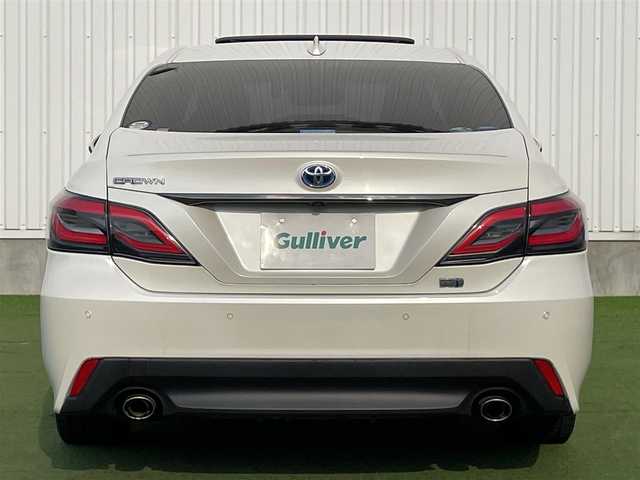 トヨタ クラウン ハイブリッド S スポーツスタイル 愛媛県 2019(令1)年 5.8万km ホワイトパールクリスタルシャイン 登録時走行距離：57769ｋｍ/純正SDナビゲーション/→フルセグTV/→CD/DVD/バックカメラ/ビルトインETC/サンルーフ/ブラインドスポットモニター/レーダークルーズコントロール/ステアリングリモコン/革巻きステアリング/前後コーナーセンサー/LEDオートライト/フォグランプ/純正18インチアルミホイール/純正フロアマット/パワーシート/スマートキー