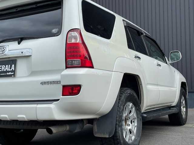 トヨタ ハイラックス サーフ SSR－X 青森県 2005(平17)年 18.3万km ホワイトパールクリスタルシャイン /４WD/社外ナビ/　（DVD/Bｔ視聴可）/社外バックカメラ/社外16インチアルミホイール/ランプ付きサイドステップ/純正ドアバイザー/純正フロアマット/バックドア・イージークローザー/リア7面プライバシーガラス/オートライト/Wエアバッグ/ABS/取説