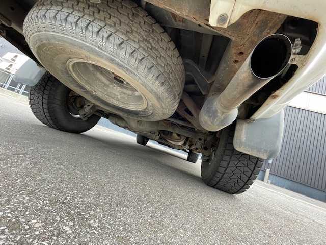トヨタ ハイラックス サーフ SSR－X 青森県 2005(平17)年 18.3万km ホワイトパールクリスタルシャイン /４WD/社外ナビ/　（DVD/Bｔ視聴可）/社外バックカメラ/社外16インチアルミホイール/ランプ付きサイドステップ/純正ドアバイザー/純正フロアマット/バックドア・イージークローザー/リア7面プライバシーガラス/オートライト/Wエアバッグ/ABS/取説