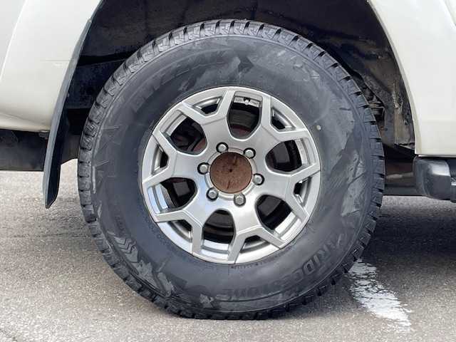 トヨタ ハイラックス サーフ SSR－X 青森県 2005(平17)年 18.3万km ホワイトパールクリスタルシャイン /４WD/社外ナビ/　（DVD/Bｔ視聴可）/社外バックカメラ/社外16インチアルミホイール/ランプ付きサイドステップ/純正ドアバイザー/純正フロアマット/バックドア・イージークローザー/リア7面プライバシーガラス/オートライト/Wエアバッグ/ABS/取説