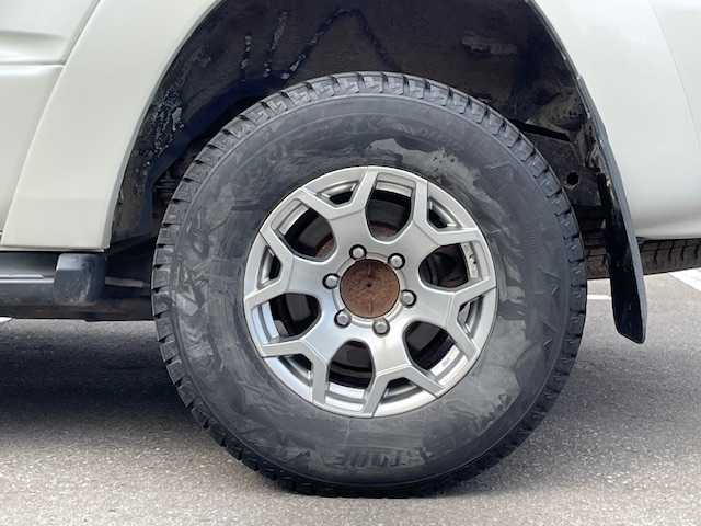 トヨタ ハイラックス サーフ SSR－X 青森県 2005(平17)年 18.3万km ホワイトパールクリスタルシャイン /４WD/社外ナビ/　（DVD/Bｔ視聴可）/社外バックカメラ/社外16インチアルミホイール/ランプ付きサイドステップ/純正ドアバイザー/純正フロアマット/バックドア・イージークローザー/リア7面プライバシーガラス/オートライト/Wエアバッグ/ABS/取説