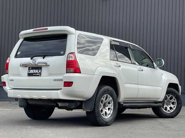 トヨタ ハイラックス サーフ SSR－X 青森県 2005(平17)年 18.3万km ホワイトパールクリスタルシャイン /４WD/社外ナビ/　（DVD/Bｔ視聴可）/社外バックカメラ/社外16インチアルミホイール/ランプ付きサイドステップ/純正ドアバイザー/純正フロアマット/バックドア・イージークローザー/リア7面プライバシーガラス/オートライト/Wエアバッグ/ABS/取説