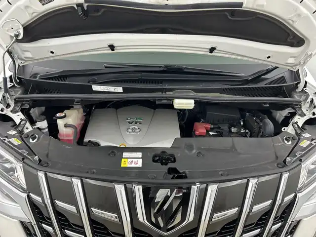 トヨタ アルファード SC 愛知県 2019(平31)年 4.9万km ホワイトパールクリスタルシャイン 禁煙車/４ＷＤ/純正10.5インチナビ/（CD/DVD/Bluetooth/フルセグTV/SD/USB)/全方位カメラ/モデリスタエアロ/JBLサウンド/AC100V電源/トヨタセーフティセンス/・プリクラッシュセーフティ/・レーントレーシングアシスト/・パーキングセンサーブレーキ/・リヤクロストラフィックアラート/・レーダークルーズコントロール/・オートマチックハイビーム/・ブラインドスポットモニター/・ロードサインアシスト/デジタルインナーミラー/ETC2.0/ドライブレコーダー/ステアリングヒーター/シートヒーター/シートベンチレーション/パワーシート/メモリシート/オットマン/両側パワースライドドア/パワーバックドア/20インチアルミホイール/スマートキー/スペアキー1本/プッシュスタート/LEDヘッドライト/オートライト/フロントフォグランプ/純正フロアマット/電子パーキングブレーキ/オートホールド/横滑り防止装置/電動格納ミラー