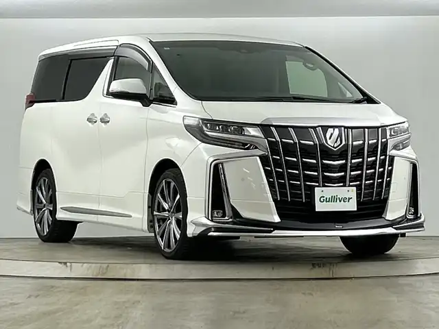 トヨタ アルファード SC 愛知県 2019(平31)年 4.9万km ホワイトパールクリスタルシャイン 禁煙車/４ＷＤ/純正10.5インチナビ/（CD/DVD/Bluetooth/フルセグTV/SD/USB)/全方位カメラ/モデリスタエアロ/JBLサウンド/AC100V電源/トヨタセーフティセンス/・プリクラッシュセーフティ/・レーントレーシングアシスト/・パーキングセンサーブレーキ/・リヤクロストラフィックアラート/・レーダークルーズコントロール/・オートマチックハイビーム/・ブラインドスポットモニター/・ロードサインアシスト/デジタルインナーミラー/ETC2.0/ドライブレコーダー/ステアリングヒーター/シートヒーター/シートベンチレーション/パワーシート/メモリシート/オットマン/両側パワースライドドア/パワーバックドア/20インチアルミホイール/スマートキー/スペアキー1本/プッシュスタート/LEDヘッドライト/オートライト/フロントフォグランプ/純正フロアマット/電子パーキングブレーキ/オートホールド/横滑り防止装置/電動格納ミラー