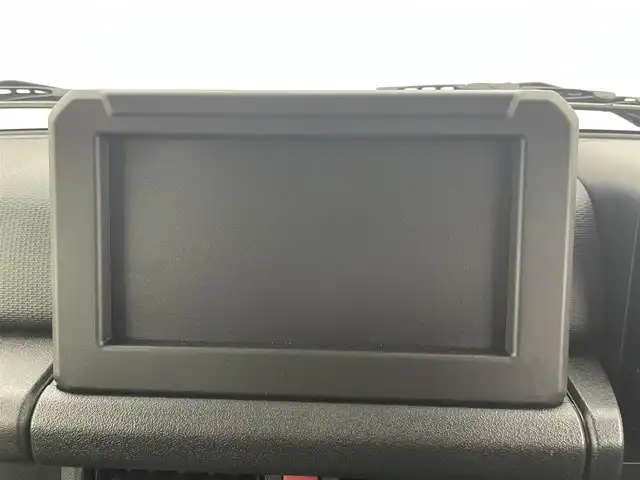 スズキ ジムニー ノマド FC 富山県 2025(令7)年 0.1千km 黒 ワンオーナー/4WD/スズキセーフティサポート/デュアルカメラブレーキサポート/アダプティブクルーズコントロール/車線逸脱警報機能/標識認識機能/後退時ブレーキサポート/ハイビームアシスト/オートLEDヘッドライト/リアパーキングセンサー/スマートキー×２/プッシュスタート/アイドリングストップ/取扱説明書/保証書