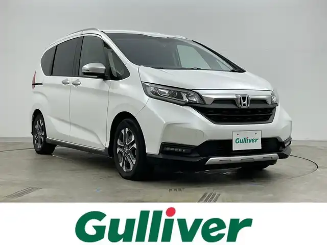ホンダ フリード ハイブリット クロスター ホンダセンシング 岡山県 2020(令2)年 6万km プラチナホワイトパール ８インチナビ/【Bluetooth/フルセグTV/CD/DVD/USB】/型番:AVIC-RL811/アルパインフリップダウンモニター/両側パワースライドドア/衝突軽減ブレーキ/レーダークルーズコントロール/社外ドライブレコーダー（前）/前席シートヒーター/ハーフレザーシート/バックカメラ/ビルトインＥＴＣ/ＬＥＤヘッドライト/純正15インチアルミホイール/エンジンスターター×1/スマートキー×2