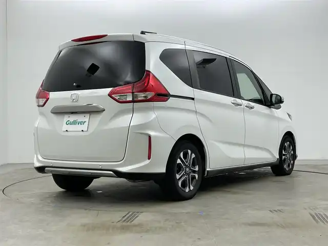 ホンダ フリード ハイブリット クロスター ホンダセンシング 岡山県 2020(令2)年 6万km プラチナホワイトパール ８インチナビ/【Bluetooth/フルセグTV/CD/DVD/USB】/型番:AVIC-RL811/アルパインフリップダウンモニター/両側パワースライドドア/衝突軽減ブレーキ/レーダークルーズコントロール/社外ドライブレコーダー（前）/前席シートヒーター/ハーフレザーシート/バックカメラ/ビルトインＥＴＣ/ＬＥＤヘッドライト/純正15インチアルミホイール/エンジンスターター×1/スマートキー×2