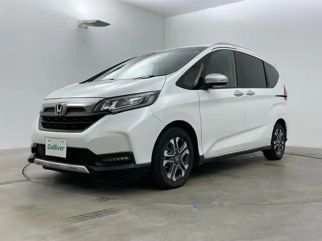 ホンダ フリード ハイブリット クロスター ホンダセンシング 岡山県 2020(令2)年 6万km プラチナホワイトパール ８インチナビ/【Bluetooth/フルセグTV/CD/DVD/USB】/型番:AVIC-RL811/アルパインフリップダウンモニター/両側パワースライドドア/衝突軽減ブレーキ/レーダークルーズコントロール/社外ドライブレコーダー（前）/前席シートヒーター/ハーフレザーシート/バックカメラ/ビルトインＥＴＣ/ＬＥＤヘッドライト/純正15インチアルミホイール/エンジンスターター×1/スマートキー×2