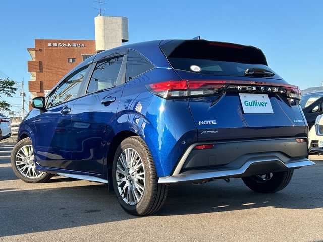日産 ノート オーテック 山口県 2021(令3)年 5.3万km オーロラフレアブルーパール AUTECH専用装備/フロントグリル/シルバーフロントプロテクター/サイドシルプロテクター/シルバーリヤプロテクター/ダークウッド調フィニッシャー/合皮アームレスト/フロントセンターアームレスト/リヤセンターアームレスト/専用ブラックレザレットシート刺繍/専用ブラック本革巻ステアリング/AUTECHエンブレム/純正メモリナビ/（AM/FM/CD/DVD/USB/Bluetooth）/バックカメラ/ハーフレザー/純正フロアマット/ドライブレコーダー（DH5-D）/LEDヘッドライト/フォグランプ