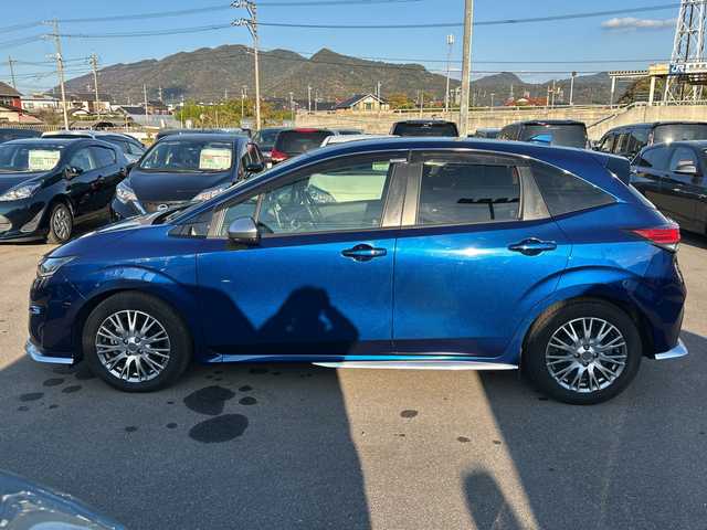 日産 ノート オーテック 山口県 2021(令3)年 5.3万km オーロラフレアブルーパール AUTECH専用装備/フロントグリル/シルバーフロントプロテクター/サイドシルプロテクター/シルバーリヤプロテクター/ダークウッド調フィニッシャー/合皮アームレスト/フロントセンターアームレスト/リヤセンターアームレスト/専用ブラックレザレットシート刺繍/専用ブラック本革巻ステアリング/AUTECHエンブレム/純正メモリナビ/（AM/FM/CD/DVD/USB/Bluetooth）/バックカメラ/ハーフレザー/純正フロアマット/ドライブレコーダー（DH5-D）/LEDヘッドライト/フォグランプ