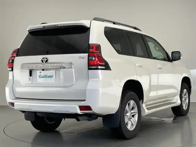 トヨタ ランドクルーザー プラド TX Lパッケージ 大阪府 2023(令5)年 4.2万km ホワイトパールクリスタルシャイン 純正９型ナビ　フルセグＴＶ　Ｂｌｕｅｔｏｏｔｈ　ムーンルーフ　ベージュレザー　７人乗　ルーフレール　バックカメラ　プッシュスタート　パワーシート　シートヒーター　エアシート　ＥＴＣ　衝突軽減　禁煙車