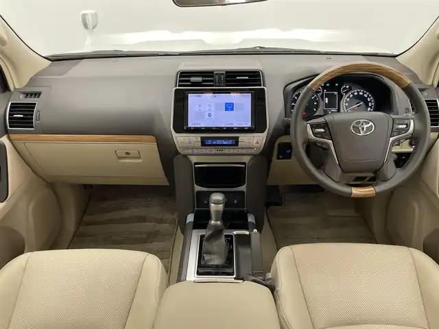 トヨタ ランドクルーザー プラド TX Lパッケージ 大阪府 2023(令5)年 4.2万km ホワイトパールクリスタルシャイン 純正９型ナビ　フルセグＴＶ　Ｂｌｕｅｔｏｏｔｈ　ムーンルーフ　ベージュレザー　７人乗　ルーフレール　バックカメラ　プッシュスタート　パワーシート　シートヒーター　エアシート　ＥＴＣ　衝突軽減　禁煙車