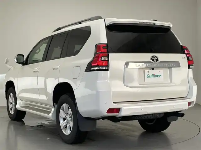 トヨタ ランドクルーザー プラド TX Lパッケージ 大阪府 2023(令5)年 4.2万km ホワイトパールクリスタルシャイン 純正９型ナビ　フルセグＴＶ　Ｂｌｕｅｔｏｏｔｈ　ムーンルーフ　ベージュレザー　７人乗　ルーフレール　バックカメラ　プッシュスタート　パワーシート　シートヒーター　エアシート　ＥＴＣ　衝突軽減　禁煙車