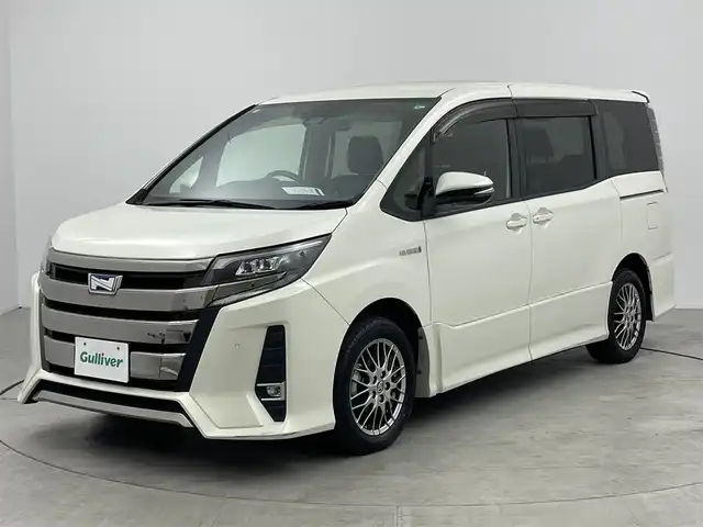 トヨタ ノア ハイブリッド Si 愛知県 2019(平31)年 4.7万km ラグジュアリーホワイトパールクリスタルシャインガラスフレーク ９インチナビＮＳＺＴ－Ｙ６８Ｔ　/フリップダウンモニター　/衝突軽減ブレーキ　/バックカメラ　/前席シートヒーター　/クルコン　　/ＥＴＣ　/アルミホイール　/ＬＥＤライト　/ダブルエアコン　/フルセグＴＶ　/スマートキー