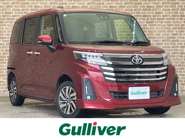 トヨタ ルーミー カスタムG 岩手県 2021(令3)年 1.3万km ファイアークォーツレッドM ４WD/両側パワースライドドア/スマートアシスト/衝突回避支援ブレーキ/車線逸脱警報/アダプティブクルーズコントロール/ハイビームアシスト/ブレーキ制御付き誤発進抑制機能/先行車発進お知らせ機能/標識認識機能/コーナーセンサー/横滑り防止装置/アイドリングストップ/ロールサンシェード/ミラー型ドライブレコーダー/オートブレーキホールド/純正CDオーディオ/LEDヘッドライト/純正14インチアルミホイール/ETC