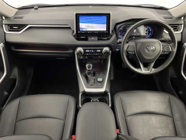 トヨタ ＲＡＶ４ ハイブリットG 鹿児島県 2021(令3)年 8.2万km ホワイトパールクリスタルシャイン 社外SDナビ/(BT/CD/DVD/AM/FM/フルセグTV)/トヨタセーフティセンス/レーダークルーズコントロール/レーンキープアシスト/オートマチックハイビーム/プリクラッシュセーフティ/レザーシート/ブラインドスポットモニター/前後コーナーセンサー/社外前後ドライブレコーダー/バックカメラ/4WD/アイドリングストップ/パワーバックドア/運転席パワーシート/シートメモリー/前席シートヒーター/ルーフレール/純正18インチアルミホイール/純正LEDヘッドライト/純正フロアマット/保証書/取扱説明書/スペアキー