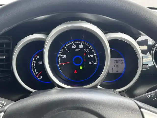 ホンダ Ｎ ＢＯＸ カスタム SSパッケージ 静岡県 2015(平27)年 6.9万km スマートブラック 両側電動スライドドア/あんしんパッケージ/ワンセグTV/GATHERSディスプレイオーディオ/バックカメラ/BLUETOOTH/ディスチャージヘッドライト(オートライトコントロール機構付)/オートリトラミラー/純正14インチアルミホイール/スーパーＵＶカットフロントドアガラス/ＩＲカットフロントウィンドウ・フロントドアガラス/リア席サンシェード/ワンタッチウィンカー/クロームメッキ・インナードアハンドル（フロント）/シルバーリング塗装ドリンクホルダー/クロームメッキ・シフトノブボタン/エアコンアウトレットノブ／リング/ナビ装着用スペシャルパッケージ/純正フロアマット