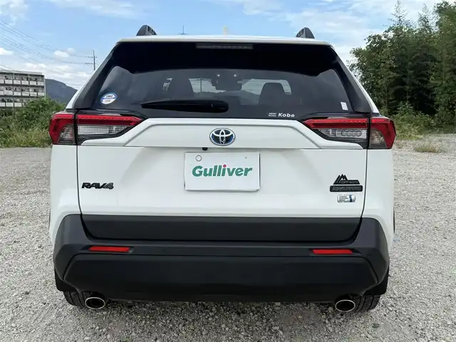 トヨタ ＲＡＶ４ HV アドベンチャー オフロードPKGⅡ 兵庫県 2023(令5)年 4.2万km スーパーホワイトⅡ パノラミックビューモニター/パワーリアゲート/ブラインドスポットモニター/デジタルインナーミラー（前後ドラレコ内蔵）/フォグランプ（Ｆ/Ｒ）/両前席シートヒーター＆ベンチレーション/ステアリングヒーター/黒革シート/メモリ付パワーシート/ルーフレール/純正10.5インチディスプレイ（車載ナビ有）/フルセグテレビ/純正18インチアルミホイール/スペアキー有り