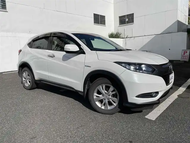 ホンダ ヴェゼル ハイブリッド X 千葉県 2014(平26)年 10.9万km ホワイトオーキッドパール 【(株)IDOMが運営する【じしゃロン八千代店】の自社ローン対象車両になります。こちらは現金ご利用時の価格です。自社ローンご希望の方は別途その旨お申付け下さい。】/社外ナビ/社外CD/DVD/SD/BT/DTV/バクカメラ/ETC/LEDライト/あんしんパッケージ