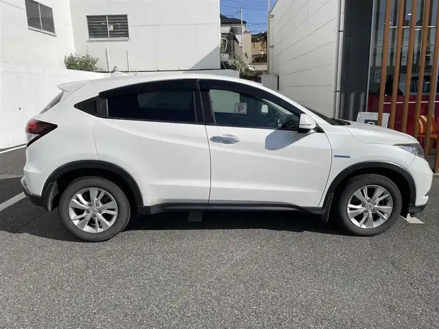 ホンダ ヴェゼル ハイブリッド X 千葉県 2014(平26)年 10.9万km ホワイトオーキッドパール 【(株)IDOMが運営する【じしゃロン八千代店】の自社ローン対象車両になります。こちらは現金ご利用時の価格です。自社ローンご希望の方は別途その旨お申付け下さい。】/社外ナビ/社外CD/DVD/SD/BT/DTV/バクカメラ/ETC/LEDライト/あんしんパッケージ