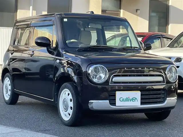 スズキ ラパン ショコラ G 岡山県 2013(平25)年 7.7万km アーバンブラウンパールメタリック 登録時走行距離76891km/社外ＳＤナビ/(AM/FM/DISC/BT/TV)/USB入力端子/パワーウィンドウ/パワーステアリング/キセノンヘッドライト/革シート/プッシュスタート/スマートキー/保証書/取扱説明書/記録簿