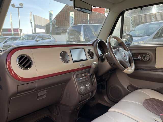 スズキ ラパン ショコラ G 岡山県 2013(平25)年 7.7万km アーバンブラウンパールメタリック 登録時走行距離76891km/社外ＳＤナビ/(AM/FM/DISC/BT/TV)/USB入力端子/パワーウィンドウ/パワーステアリング/キセノンヘッドライト/革シート/プッシュスタート/スマートキー/保証書/取扱説明書/記録簿